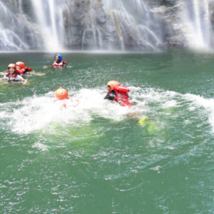 Swim under the falls